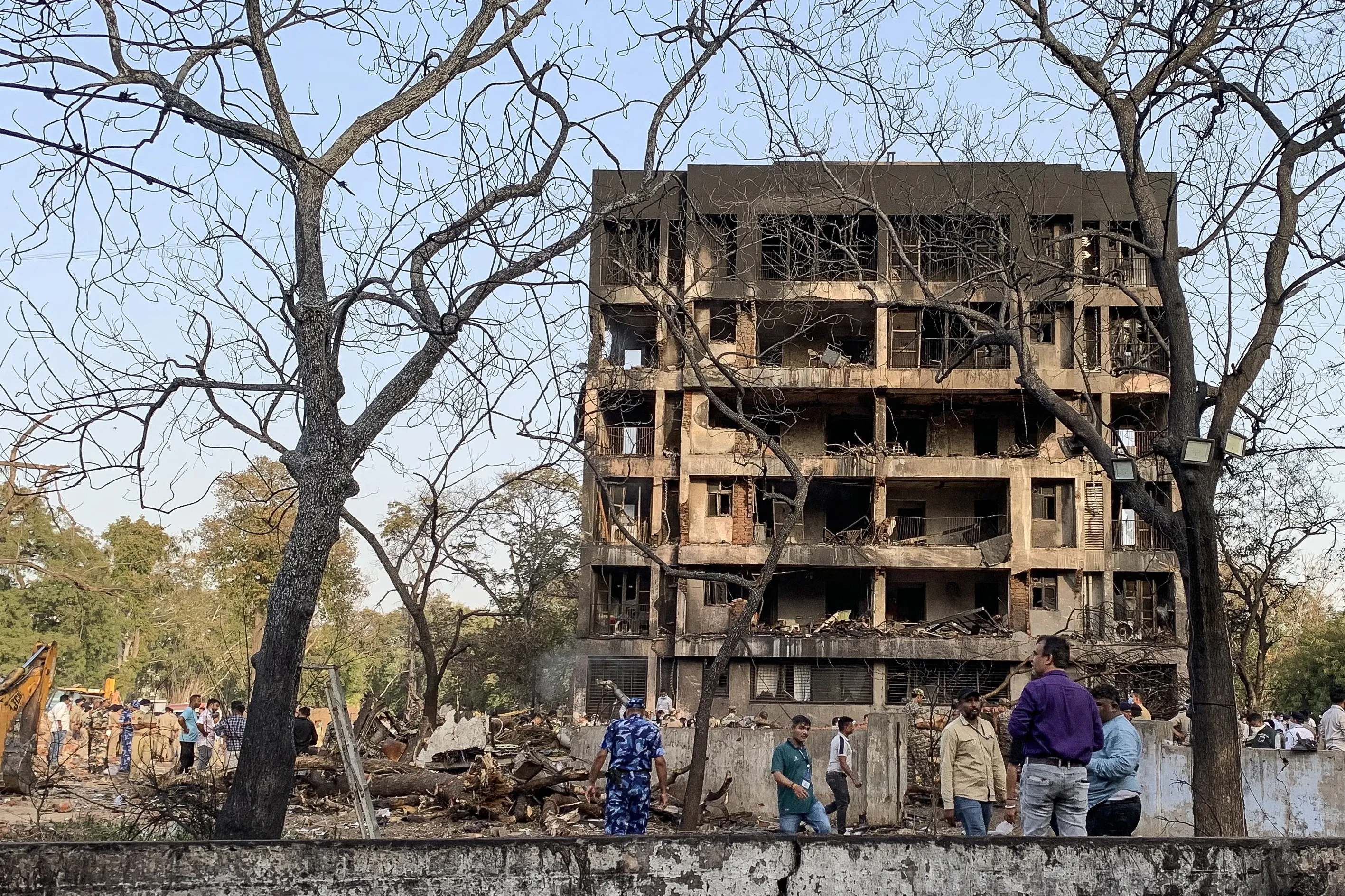 A general view shows a damaged building at the site where Air India flight 171 crashed in a residential area near the airport in Ahmedabad on June 12, 2025. / Credit: SAM PANTHAKY/AFP via Getty Images